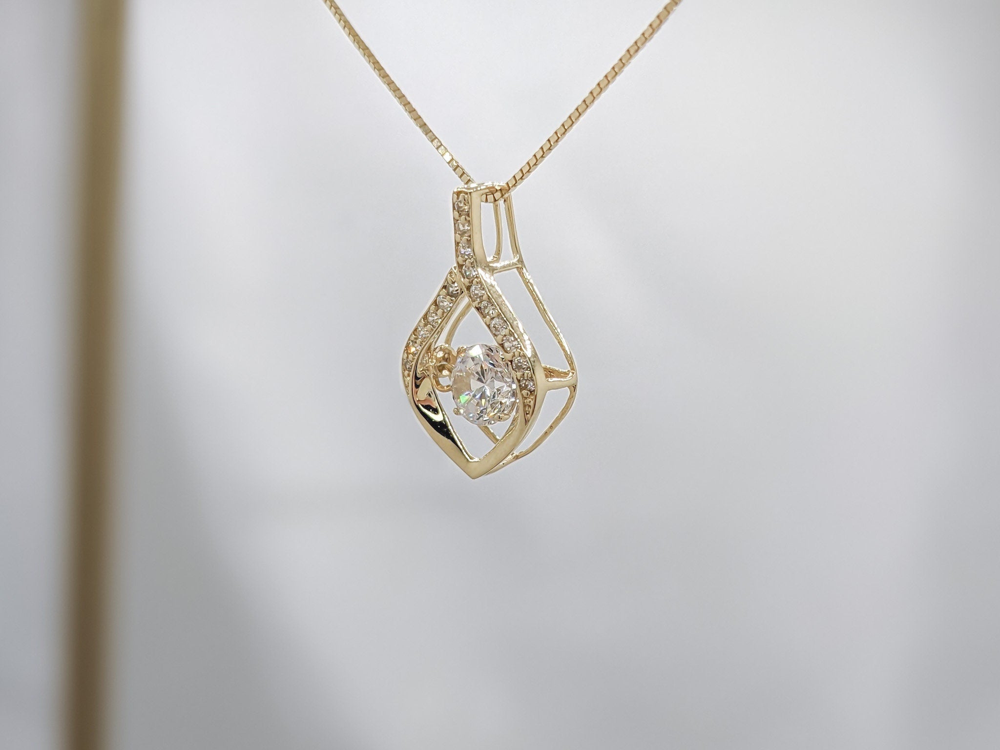 Tear Drop Dancing Pendant